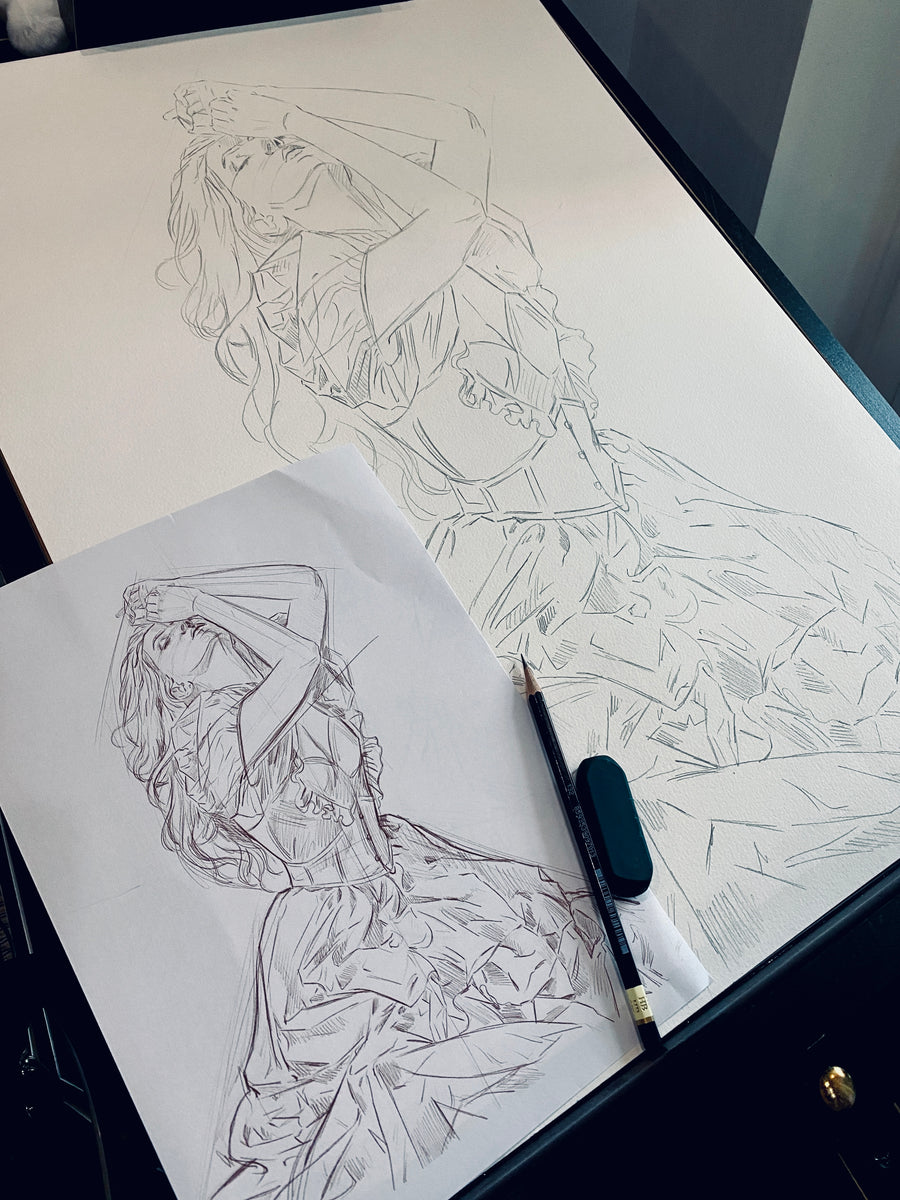 Artistic sketches of a woman in a dress on paper with a pen and eraser.