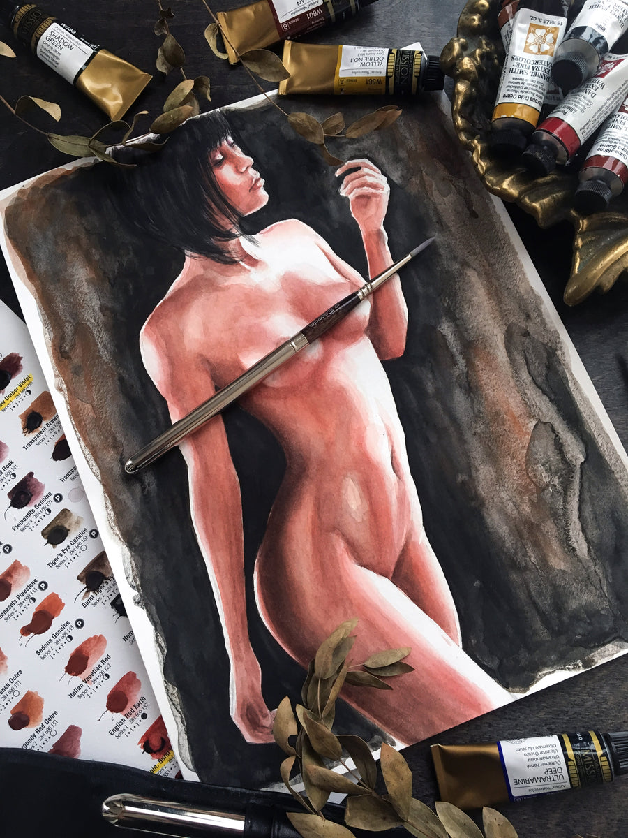 Painting of a nude figure on a canvas with art supplies around