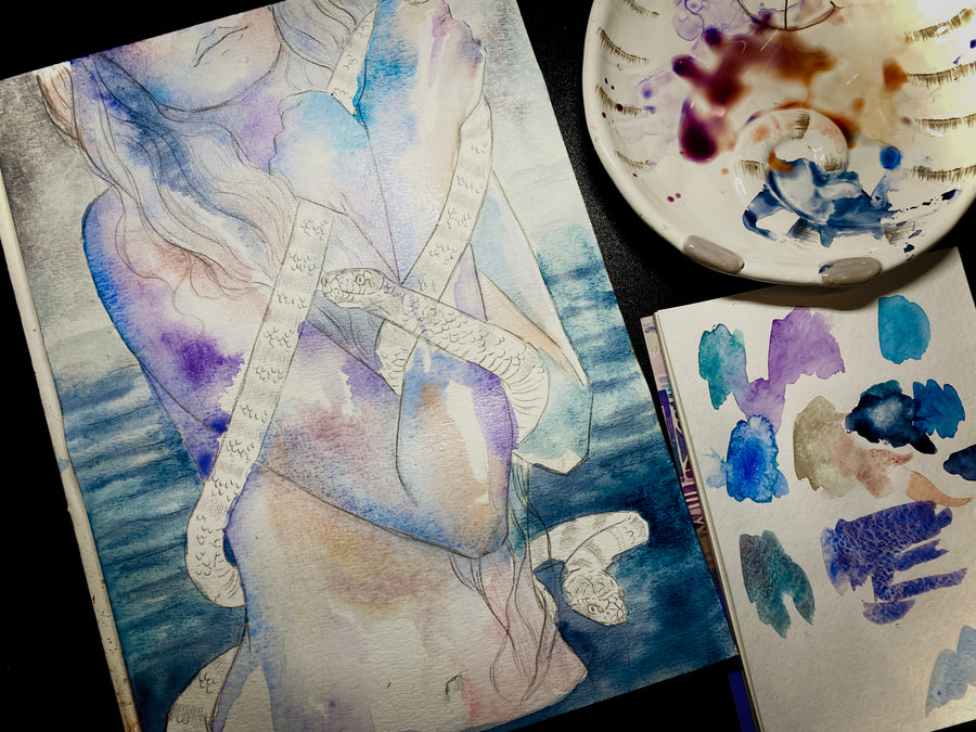 Artistic watercolor painting of a figure with a brush and watercolor paper in the background